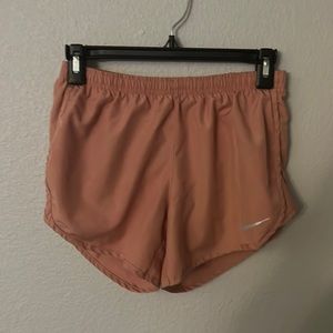 rose colored adult xs nike dry fit running shorts
